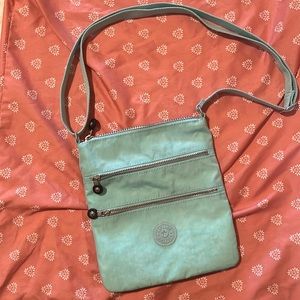 New and unused baby blue Kipling purse